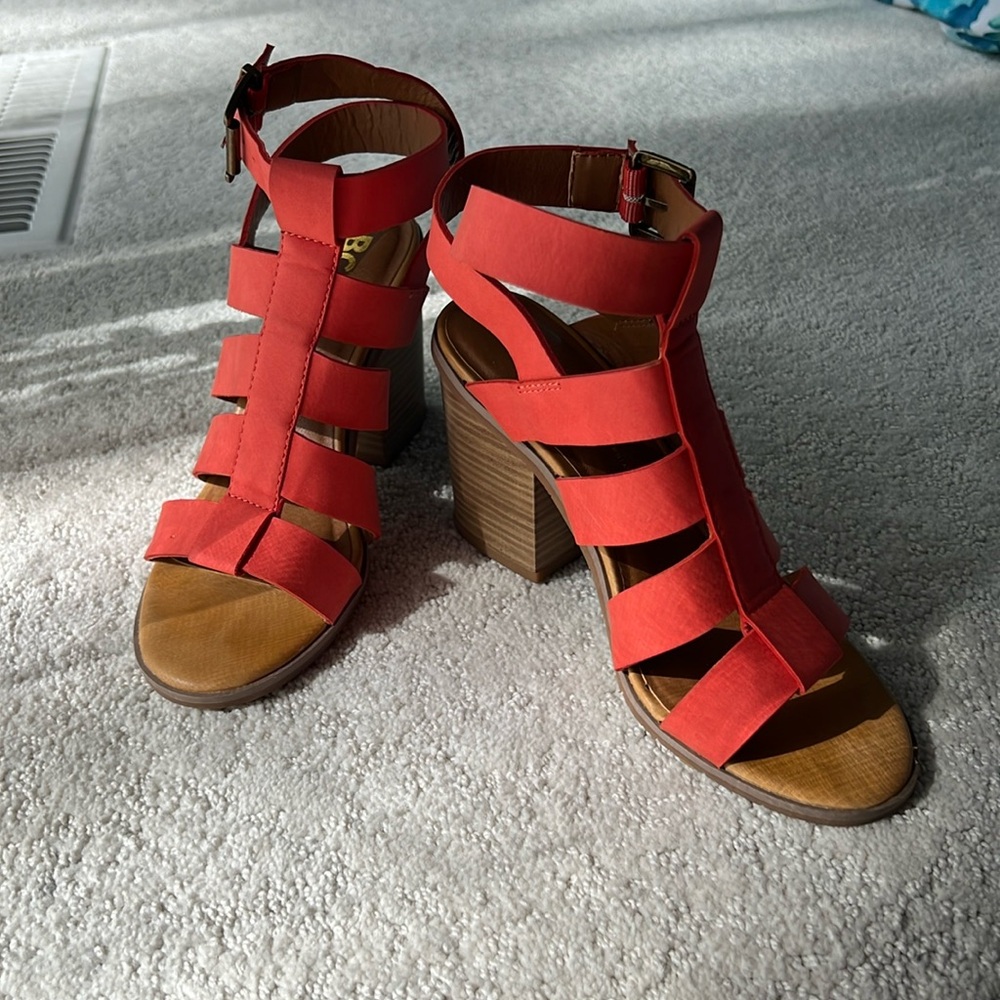 Beautiful orange sandals with a 3 inch heel